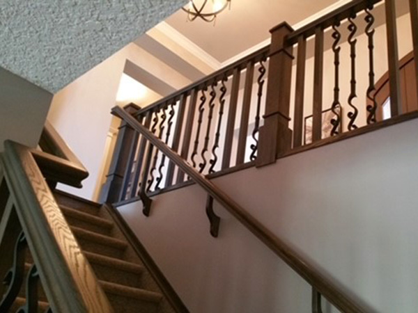Looking up at landing - Maple Railings Forged Spindles